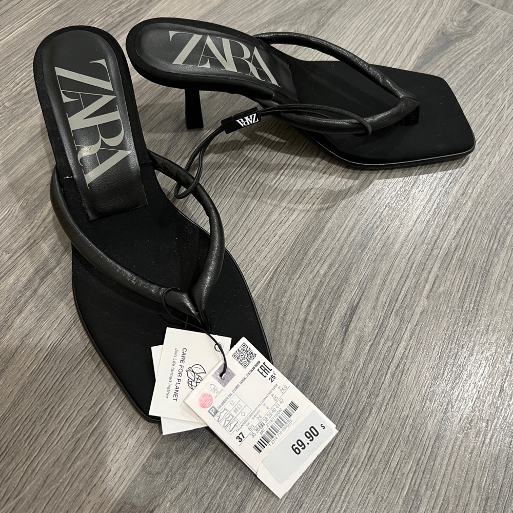 Black leather heeled sandals